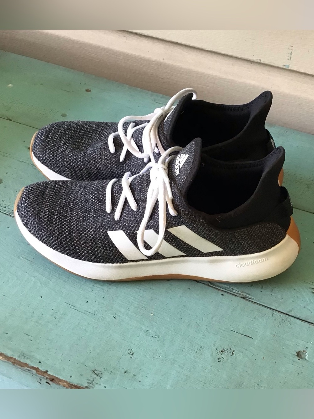 Adidas athletic shoes.